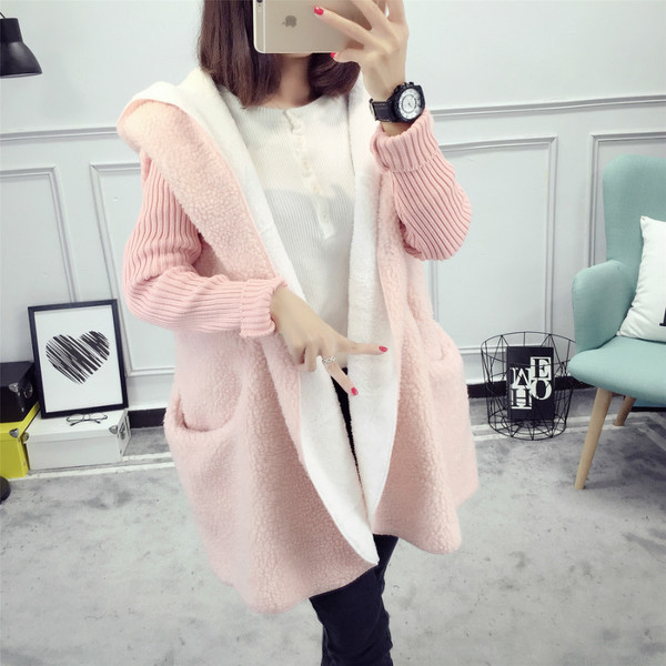 Ζεστή και μακρύ χειμωνιάτική ζακέτα με πλεκτά μανίκια σε διάφορα χρώματα