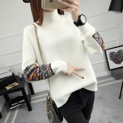 Χειμερινό γυναικείο πουλόβερ με πολύχρωμο μανίκι και κολάρο σε ευρύ σχέδιο