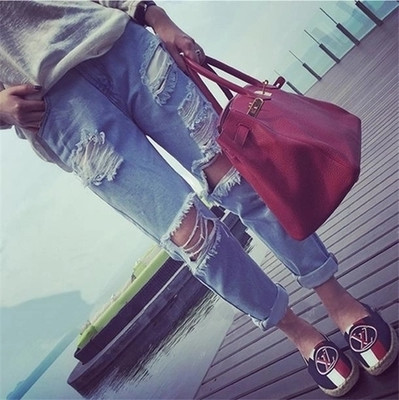 Κομψά γυναικεία τζιν  - σκισμένη και με  ψηλή μέση