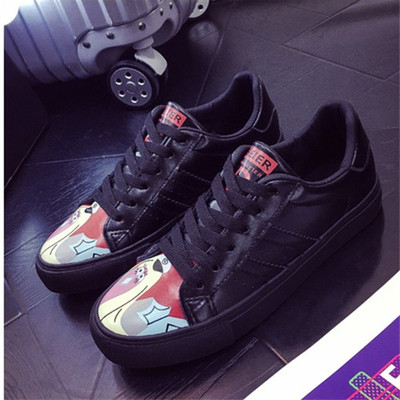 Όμορφα γυναικεία πάνινα παπούτσια σε λευκό και μαύρο χρώμα