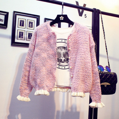 Άνετη γυναικεία ζακέτα  , κατάλληλη για  την άνοιξη και το  φθινόπωρο