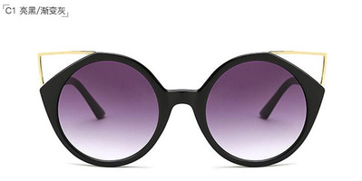 Μοντέρνα γυαλιά ηλίου με υψηλή υπεριώδη προστασία και μια ενδιαφέρουσα μη τυποποιημένη μορφή γυαλιού