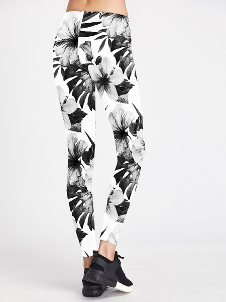 Αθλητικό γυναικείο κολάν σε λευκό χρώμα με floral στοιχεία κατάλληλα για αθλητισμό και τη  καθημερινή ζωή