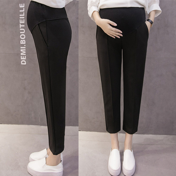 Κομψά παντελόνια 7/8 για έγκυες γυναίκες σε μαύρο και μπεζ χρώμα