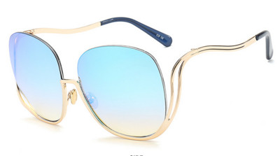 Γυναικεία γυαλιά ηλίου με ενδιαφέρον σχήμα πλαισίου