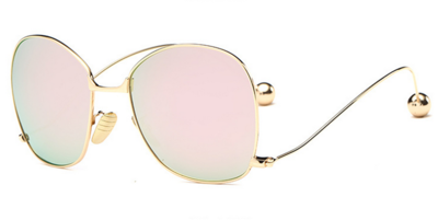 Актуални дамски слънчеви очила с нестандартна форма на рамките