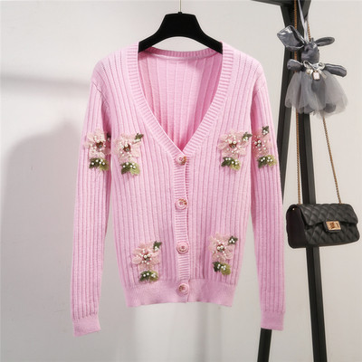 Актуална дамска жилетка с флорални мотиви и V-образно деколте