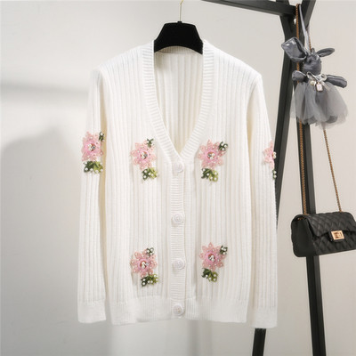 Актуална дамска жилетка с флорални мотиви и V-образно деколте