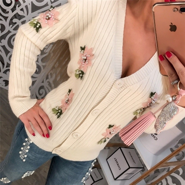 Актуална дамска жилетка с флорални мотиви и V-образно деколте