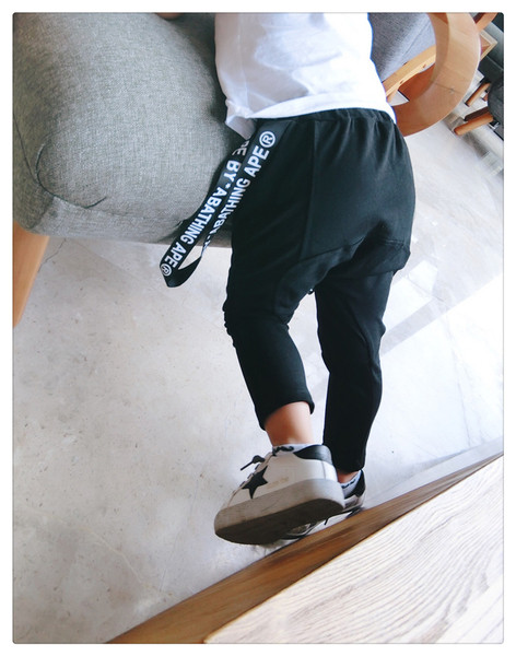 Спортно-елегантни детски панталони тип потур в черен цвят