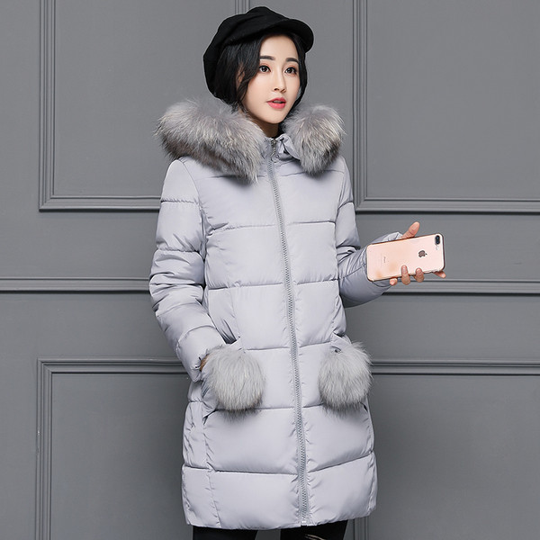 Стилно дамско дълго яке тип грейка с много актуални пухчета