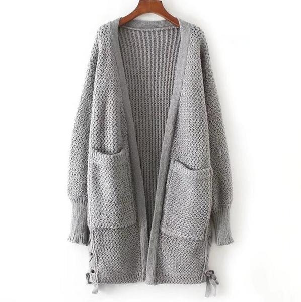 Актуална дълга дамска жилетка с джобчета и кръстосани връзки