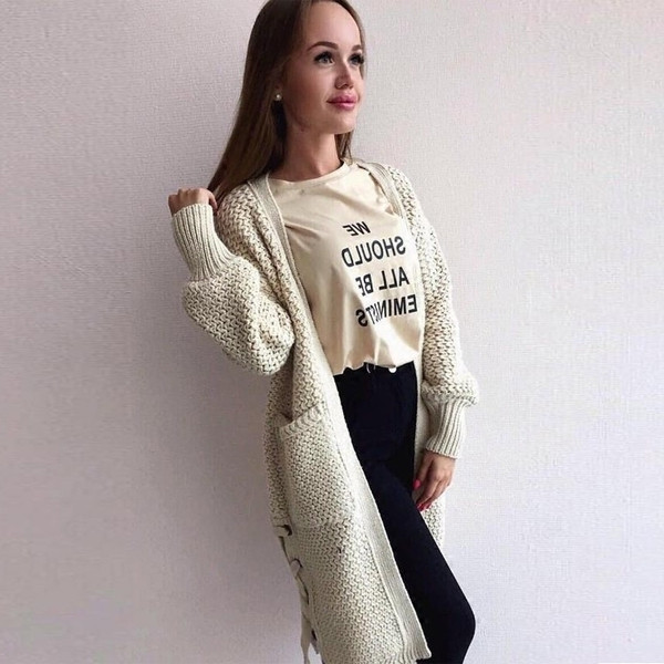 Актуална дълга дамска жилетка с джобчета и кръстосани връзки