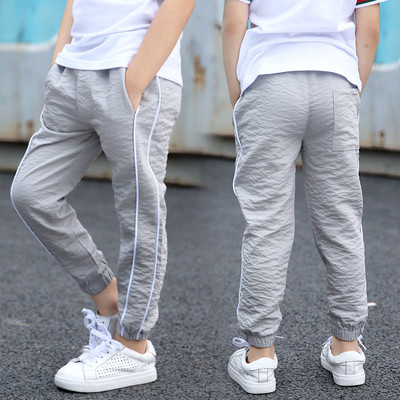 Αθλητικό παιδικό παντελόνι  για αγόρια σε δύο  χρώματα και με λάστιχα 