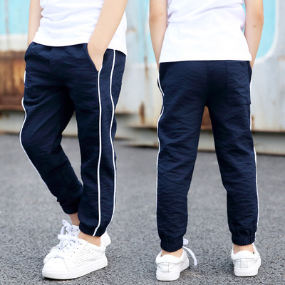 Αθλητικό παιδικό παντελόνι  για αγόρια σε δύο  χρώματα και με λάστιχα 