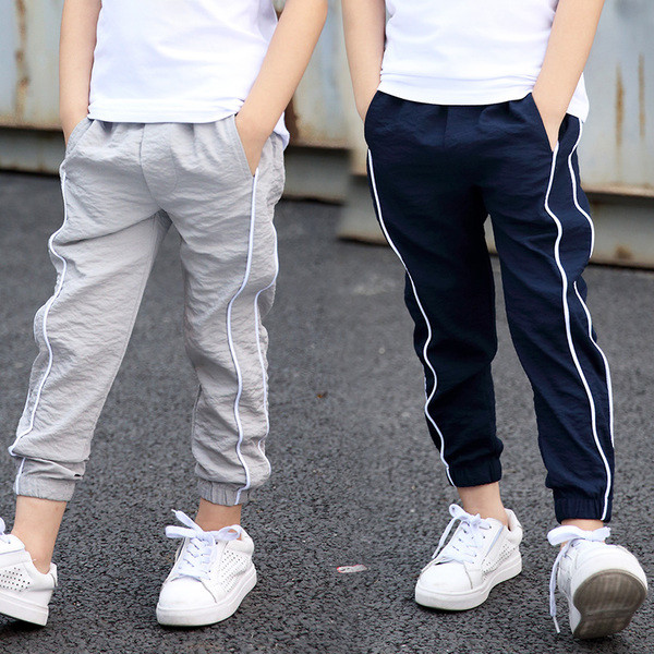 Αθλητικό παιδικό παντελόνι  για αγόρια σε δύο  χρώματα και με λάστιχα 