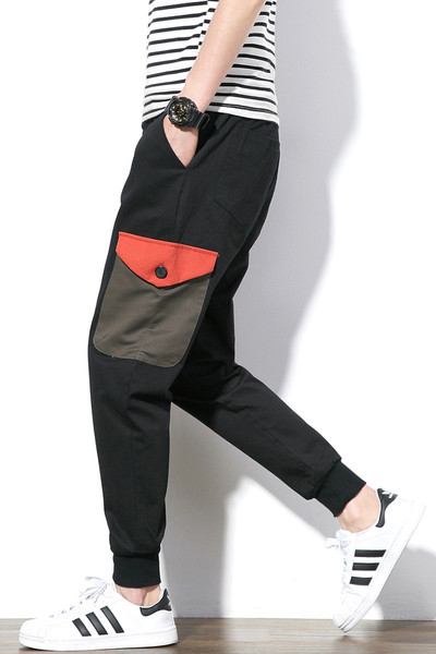 Αθλητικά αντρικά παντελόνια σε ευρύ σχέδιο με τσέπες