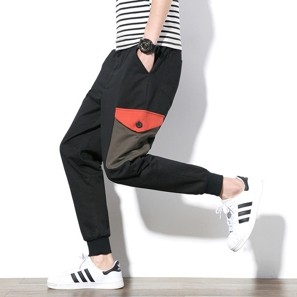 Αθλητικά αντρικά παντελόνια σε ευρύ σχέδιο με τσέπες