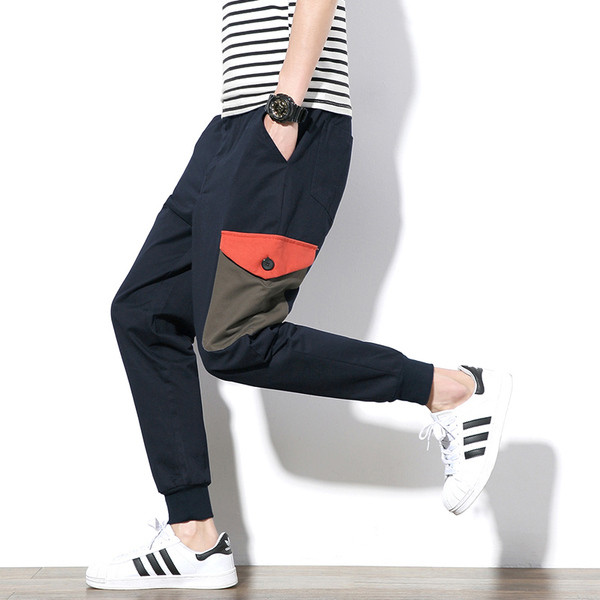 Αθλητικά αντρικά παντελόνια σε ευρύ σχέδιο με τσέπες