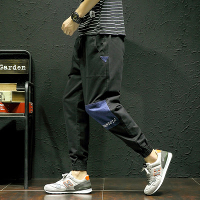 Κομψά αντρικά παντελόνια καμουφλάζ και μαύρο χρώμα