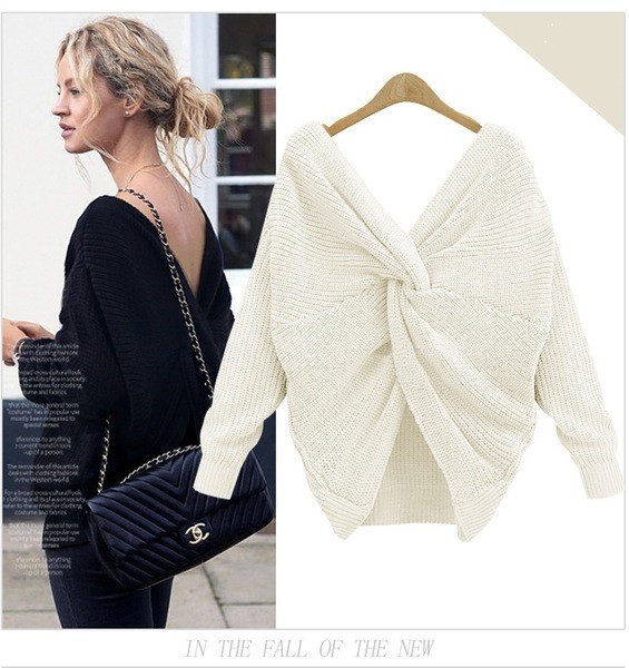 Топъл плетен дамски пуловер с ефектен гръбвя