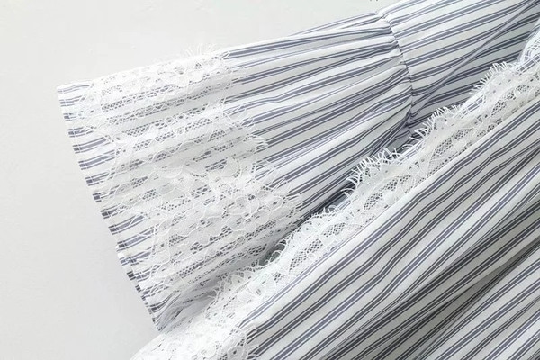 Γυναικεία μπλούζα σε γκρι χρώμα και μανίκια