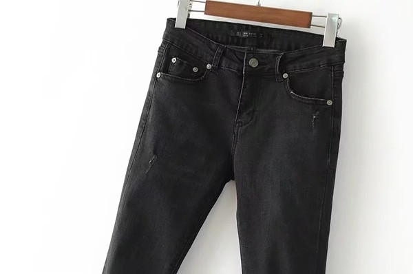 Μοντέρνα γυναικεία τζιν - σκισμένη, ψηλή μέση