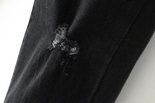 Μοντέρνα γυναικεία τζιν - σκισμένη, ψηλή μέση