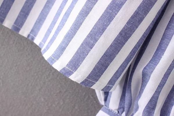 Γυναικείο πουκάμισο για το φθινόπωρο με μανικέτια με μανσέτες