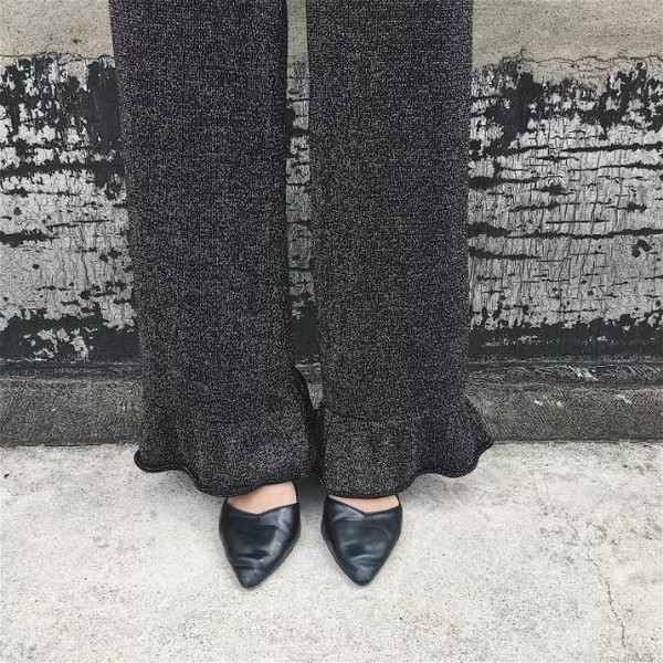 Κομψά γυαλιστερά παντελόνια με πέπλο