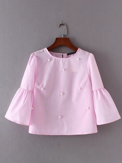 Γλυκιά γυναικεία μπλούζα με μανίκια 3/4 και διακοσμητικά σφαιρίδια