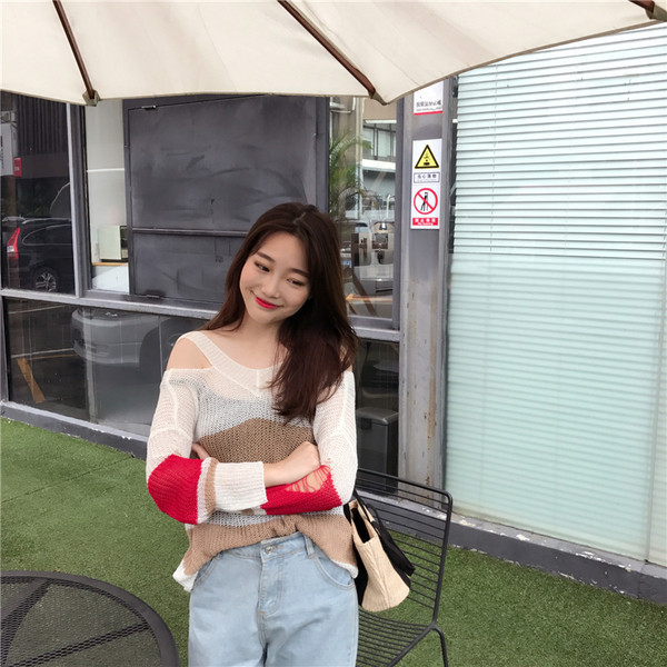 Όμορφο γυναικείο πουλόβερ με ευρύ μοτίβο 