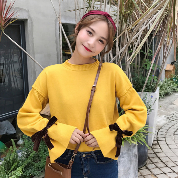 Γυναικείο πουλόβερ για το χειμώνα με ωραία πλεκτά