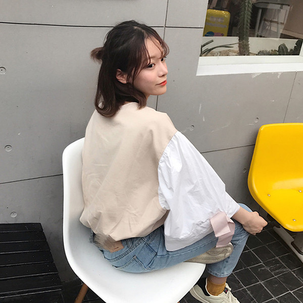 Κομψή γυναικεία μπλούζα σε ευρύ μοτίβο με κορδέλες