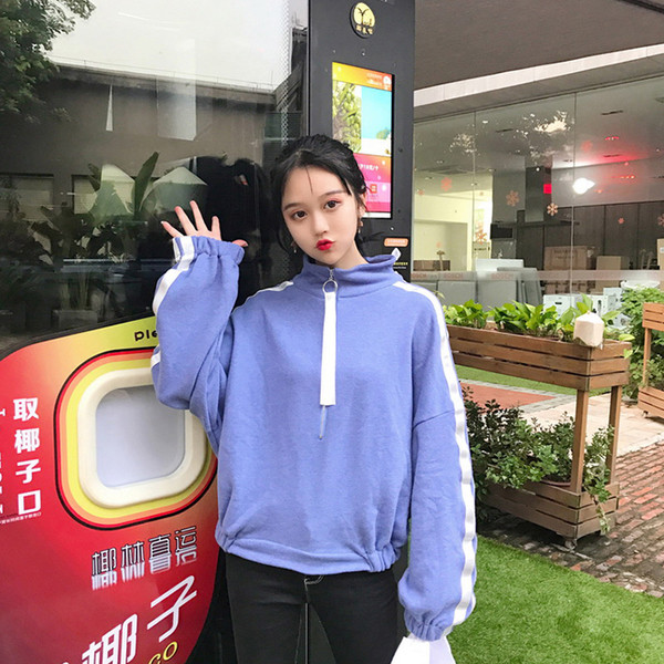 Μοντέρνο  γυναικείο πουλόβερ  σε ευρύ σχέδιο και σε δύο χρώματα