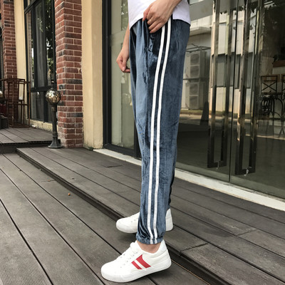 Κομψό γυναικείο παντελόνι με λωρίδες σε διάφορα χρώματα