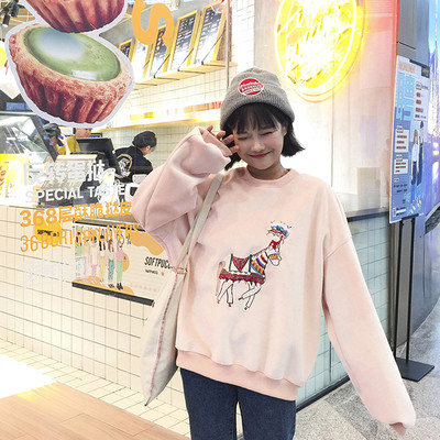 Ευρύ γυναικείο πουλόβερ  σε μαύρο και ροζ με applicqué