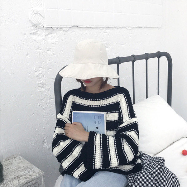 Γυναικείο πουλόβερ σε μαύρο και άσπρο χρώμα