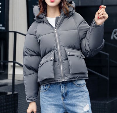 Μεγάλο χειμωνιάτικο γυναικείο μπουφάν με τσέπες και κουκούλα σε διάφορα σχέδια και χρώματα