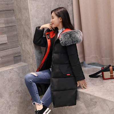 Γυναικείο ζεστό χειμωνιάτικο μακρύ μπουφάν με εκτύπωση στην πλάτη και μαλακή γούνα στην κουκούλα