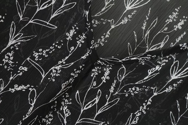 Κομψή  γυναικεία μπλούζα με κομμένα μανίκια