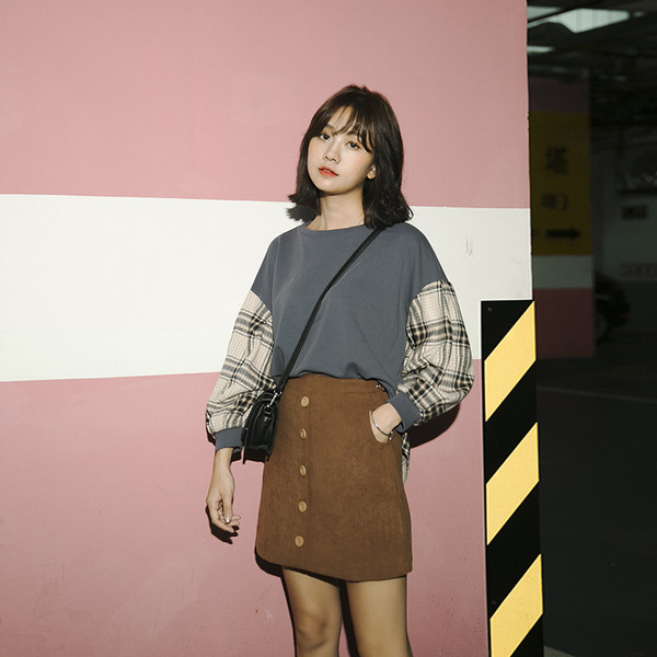 Γυναικέια μπλούζα σε ένα ευρύ σχέδιο