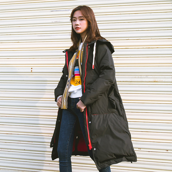 Μακρύ χειμωνιάτικο γυναικέιο μπουφάν  σε δύο χρώματα με κουκούλα