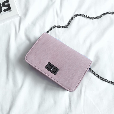 Μίνι θήκη σε τέσσερα χρώματα με μεταλλική λαβή