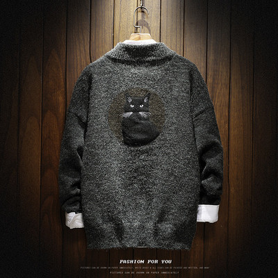 Μοντέρνο πουλόβερ από μαλλί με applicqué και ημι-υψηλό χαλαρό κολάρο σε σχήμα O