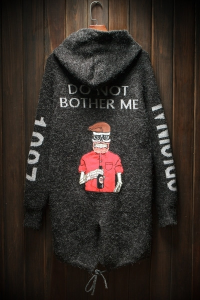 Κομψή μακρύ γιλέκο από μαλλί με καπέλο στην πλάτη και πρακτική κουκούλα