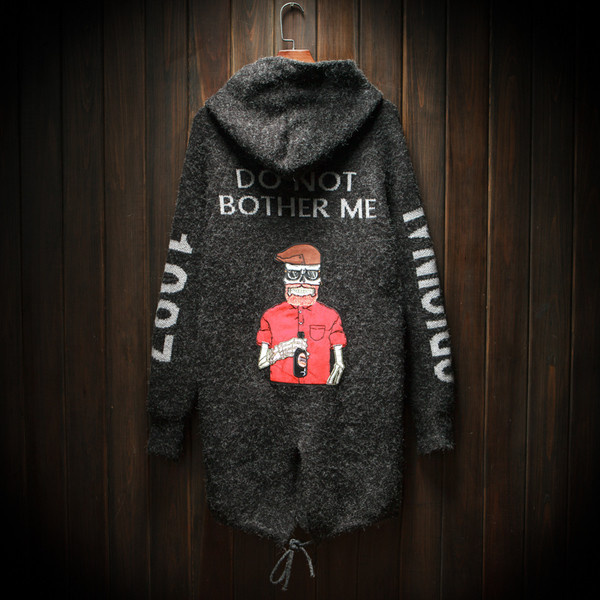 Κομψή μακρύ γιλέκο από μαλλί με καπέλο στην πλάτη και πρακτική κουκούλα