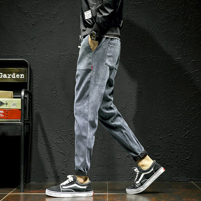 Περιστασιακά σπορ και κομψά παντελόνια ανδρών με μεγάλες πρακτικές τσέπες - ευρύ μοτίβο