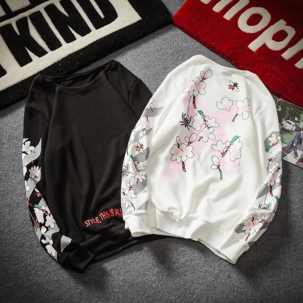 Κομψή σπορ-κομψή μπλούζα με κολάρο σε σχήμα O και floral σχέδια