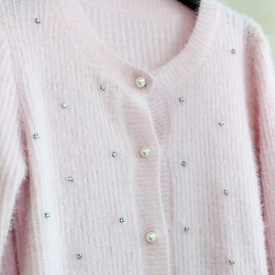 Πολύ χαριτωμένο γιλέκο και μαργαριτάρι ροζ στο μωρό ροζ χρώμα